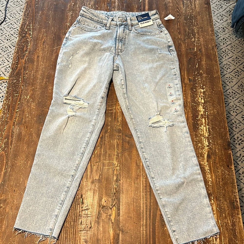 brand new, light wash jeans